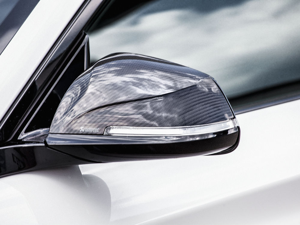 Akrapovic Carbon Fibre Mirror Cap Set - Gloss for BMW M2/M140i/M240i/340i/440i (F87, F2X, F3X) - ModsDirect