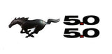 Ford Genuine Mustang GT Black Badging Kit featuring sleek black 5.0 emblems and iconic Mustang running horse logo.